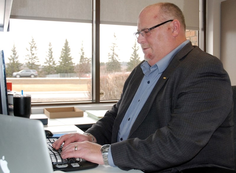 Sundre&#8217;s new interim chief administrative officer Al Harvey — pictured here last week in his office — assumed his position on Monday, March 13. He aims to use some 30