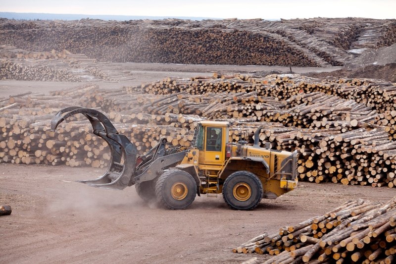 Crews move raw lumber at the Sundre Forest Products mill west of Sundre in this file photo. West Fraser general manager Bruce Alexander told the Round Up last week that the