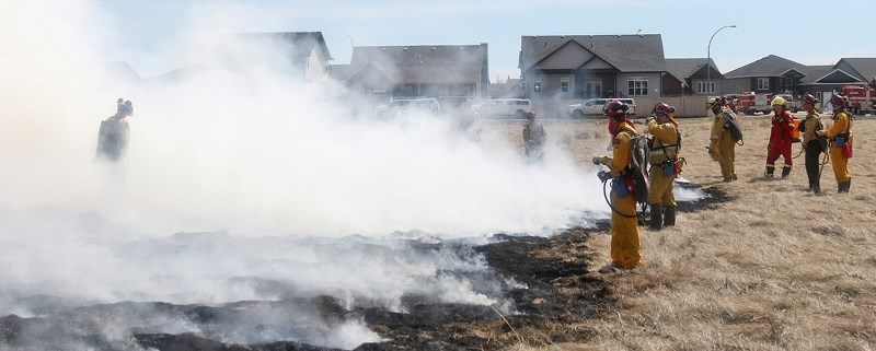 Sundre residents who live in the northeast subdivision overlooking the grass field got front row seats to quite a show last week when members of the Sundre Fire Department