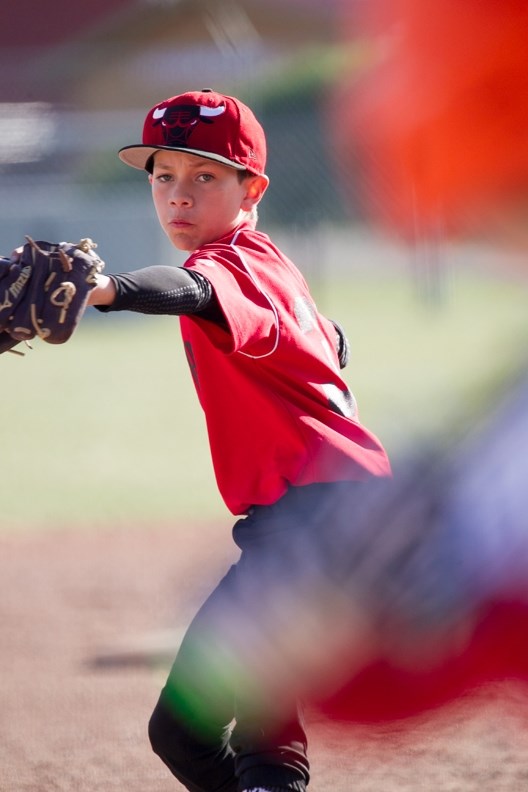 Sundre peewee baseball player Montego Valle pitches the ball during Sundre&#8217;s game against Didsbury in Sundre on May 9.