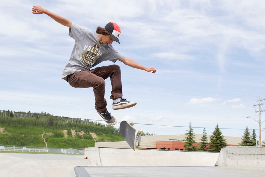 Chris Campkin gets some air as he practises some tricks at the Sundre Skatepark on June 7.