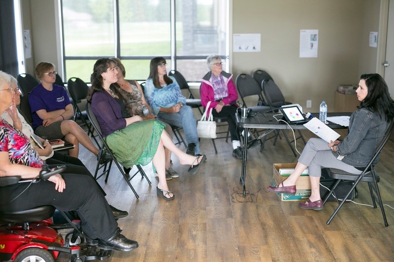 Trish Whyte, a stakeholder engagement advisor with the Ministry of Seniors and Housing, gives a presentation during an event at the Sundre Seniors&#8217; Supportive Living