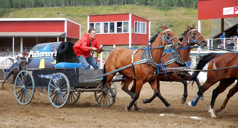 Cole Adamson did not even flinch as his hat flew off during the fourth heat of the final chuckwagon races on Sunday, Aug. 13 during the 14th annual Bulls and Wagons event.