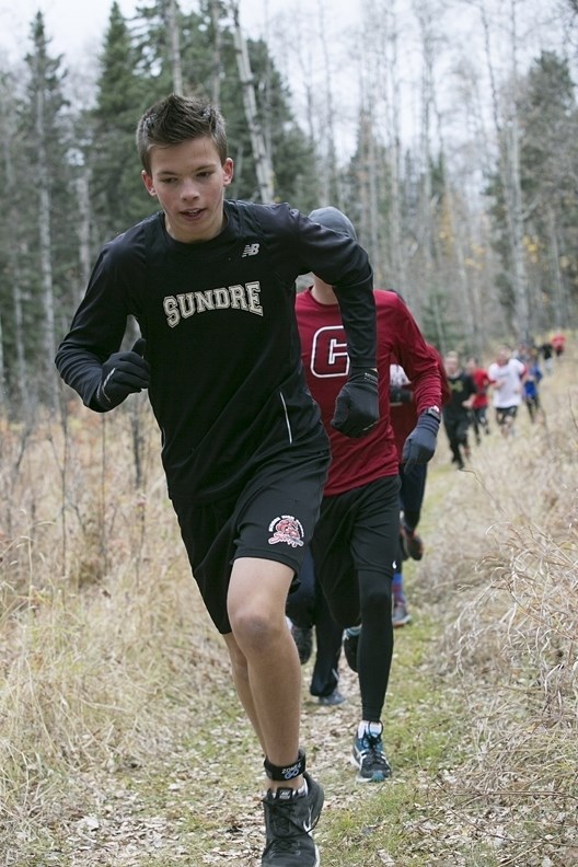 Sundre High School student Julian van den Hadelkamp competes in a cross country zones meet at Snake Hill in Sundre on Wednesday, Oct. 11. Hadelkamp went on to qualify for