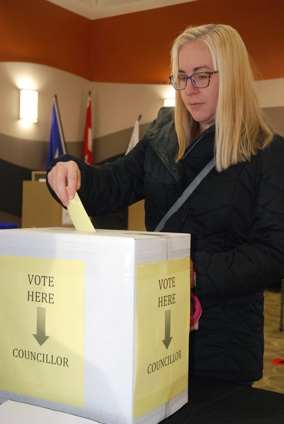Kim Free casts a ballot in Sundre&#8217;s municipal election earlier this morning at the town office. Polls remain open until this evening at 8 p.m.