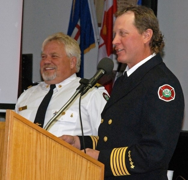 Butts shared some smiles and laughs as he shook hands with his colleagues, pictured here with Captain Dave Bennett.