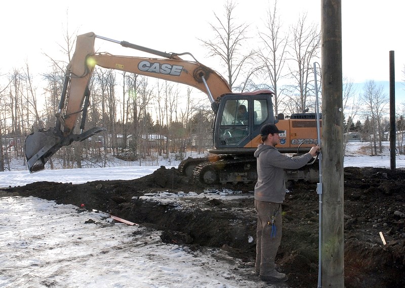 Efforts to prepare the new outdoor rink near the Sundre Skatepark were well underway last week. Light posts were donated by Fortis, while Mountain View Electric installed the 