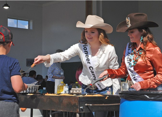  Rodeo royalty contestant Jesse Miller, left, and Miss Rodeo Sundre 2018-19 Jayden Calvert served with a smile many people who attended the breakfast. Simon Ducatel/MVP Staff