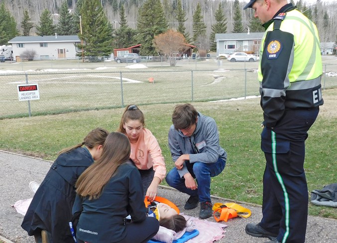  From left: Sundre High School Grade 11 students Megan Moore and