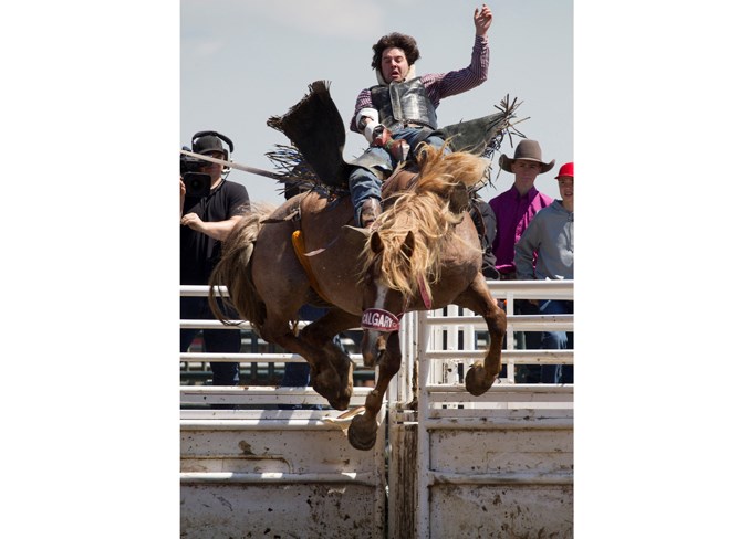  Cole Jamieson competes in bareback at the rodeo.