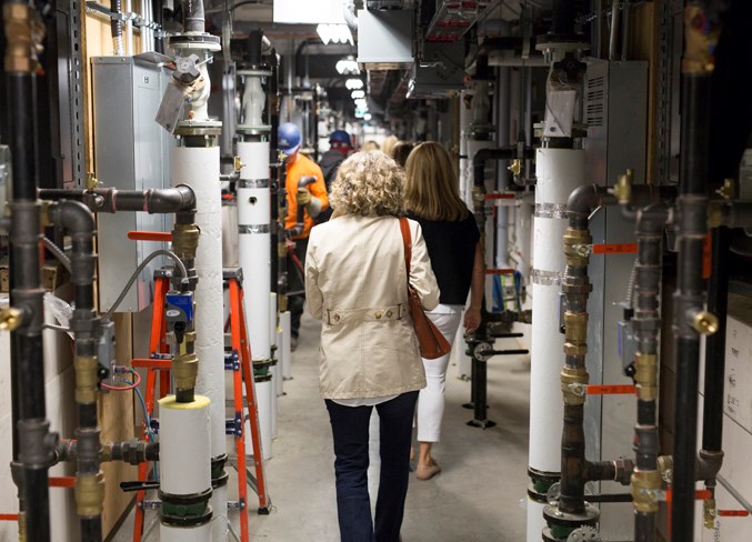  People take a tour through the innovative, state-of-the-art facility.