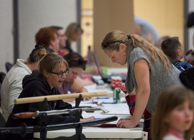  Residents check out on Sept. 5 local programs and clubs at the Sundre Community Centre during the annual registration night.