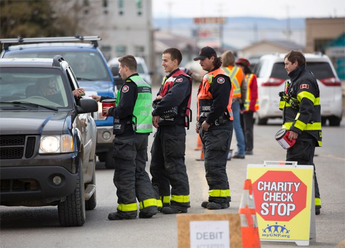  In all, 16 volunteers, including four members of the Sundre Fire Department, an off-duty RCMP officer as well as the peace officer, two town councillors, and some GNP board members spent Friday, Oct. 18 soliciting donations from passing motorists on Main Avenue.