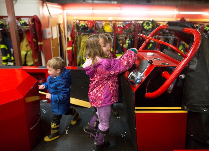 Eva Beaupre explores the department&#8217;s river boat during the event.