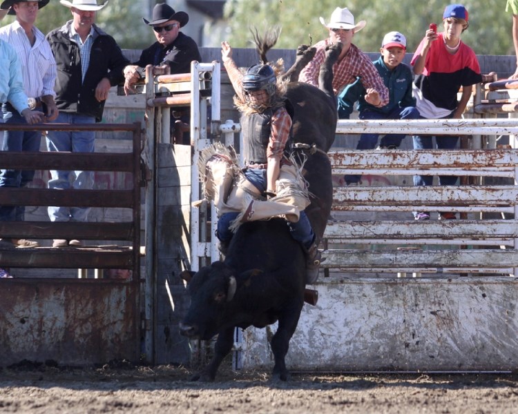 Sonja Pfeifer at the 2011 Cochrane Lions Club Rodeo aboard Richards Rodeo&#8217;s Hillbilly Highway.