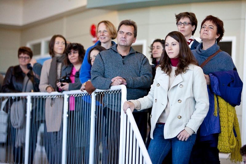 Olds High School principal Tom Christensen (centre) along with 16 international delegates toured the high school last Thursday.