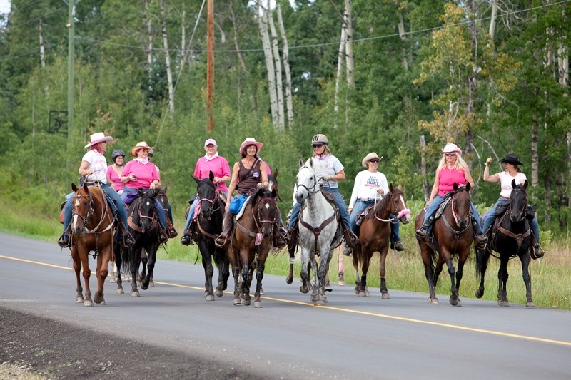 Wild Pink Yonder trail riders in Water Valley on Aug. 22. &#8216;The hard work has paid off