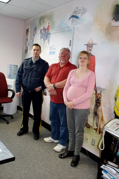 OATCS members Len Wagner (centre) and Stephanie Catduel (right) met with Didsbury RCMP Sgt. Jeff Jacobson (left) on Dec. 15 to discuss OATSC&#8217;s recent branching out to