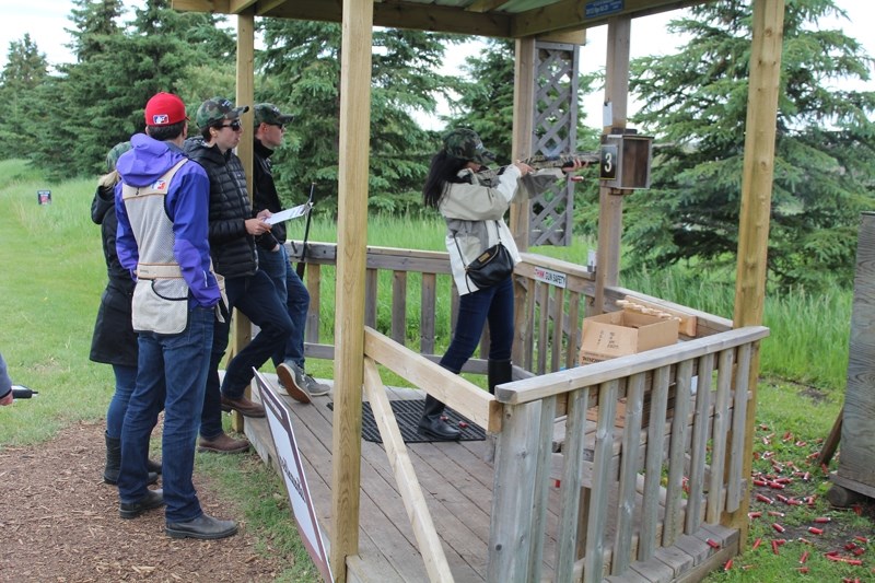 Veronica Wong shoots at a clay target during the Clays for Cottage shooting event at Silver Willow Sporting Club near Carstairs on June 21. The event was a fundraiser for the 