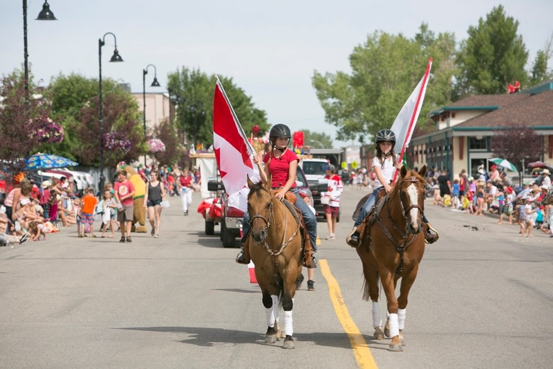 Horseback riders make their way down 10th Avenue in Carstairs during the annual Beef and Barley Days parade.