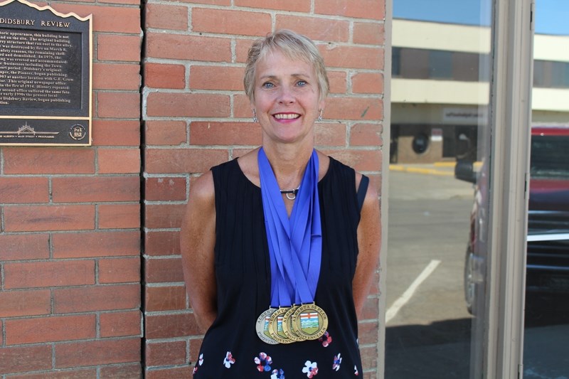 Patti Wilson of Didsbury picked up three golds and two silvers in swimming at the recent Alberta 55+ Games in Calgary.