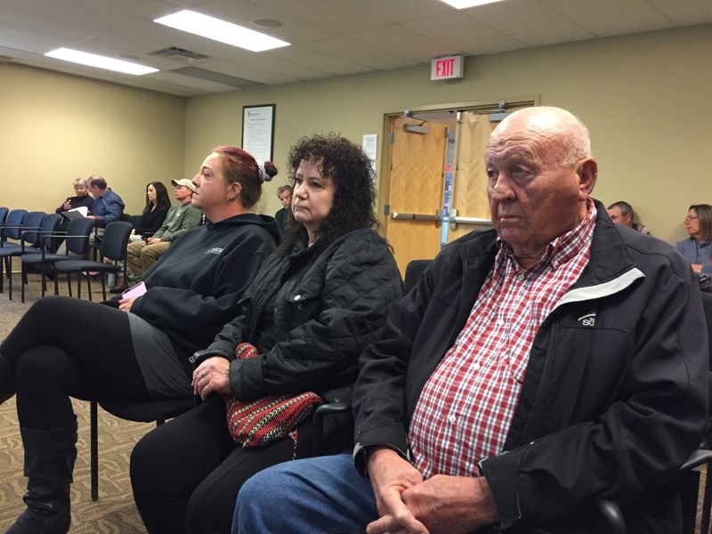 Myron Thompson, right, attends the Sept. 13 Mountain View County council meeting.