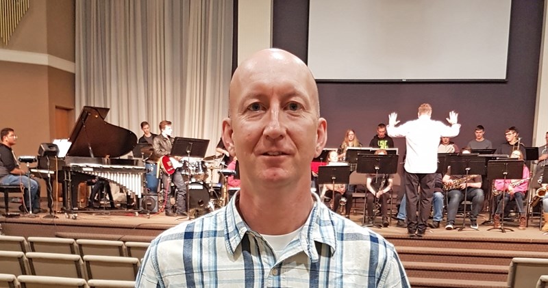 Kirk Wassmer, band director for Didsbury High School, was recently honoured by his peers for his contribution to band in the province.