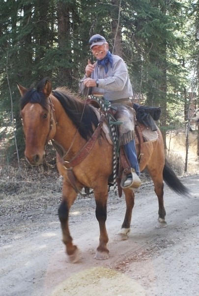 Gordy Cunningham leads other riders onto the trail.