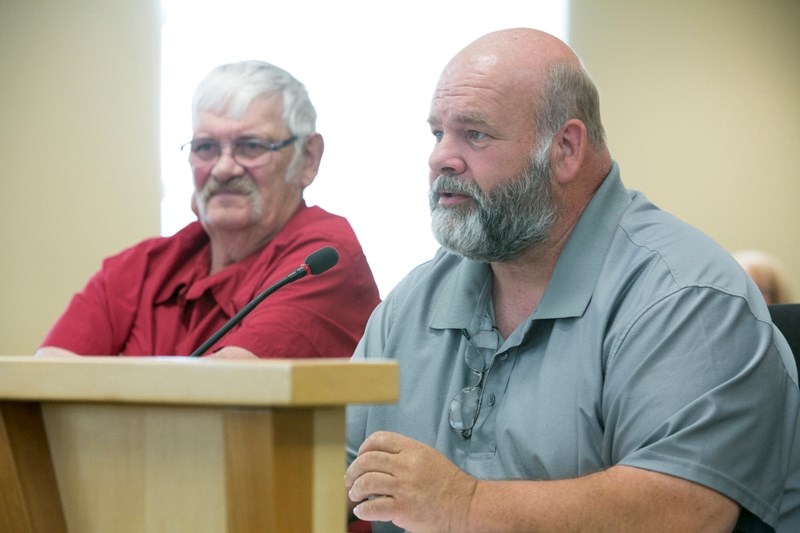 Westward Ho Campers Association president Pat Strey, right, and longtime camp manager Gord Toews speak with the policies and priorties committee.