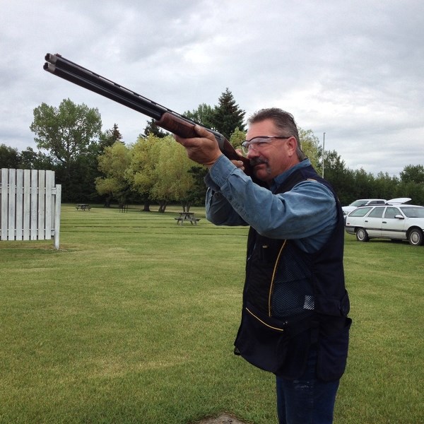 Brad Semaka from Olds checks his aim during the 2016 Alberta Provincial Skeet Championships at the Lone Pine Clay Target Club.