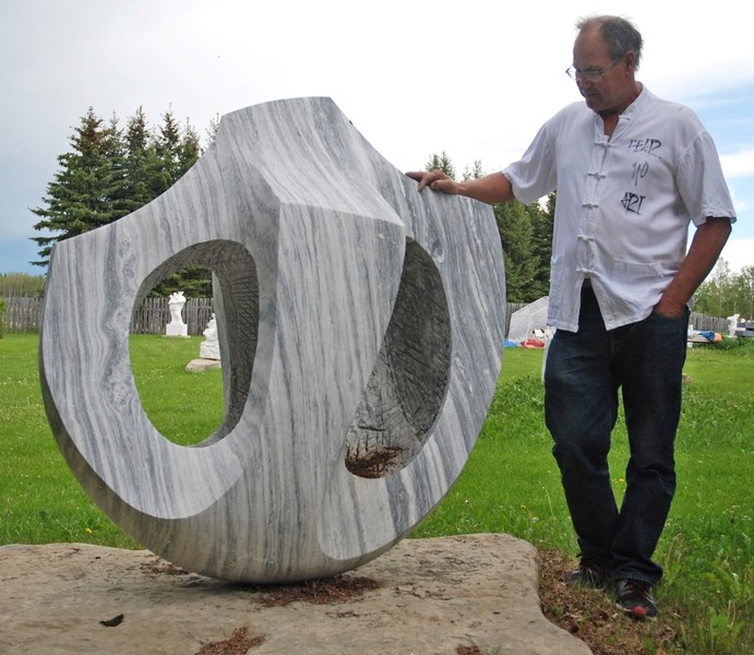 Morton Burke recently offered the Gazette a tour of Bergen Rocks, located south of Sundre on his property. Pictured here is Rising Sun, a marble piece by Peerapong Doungkaew