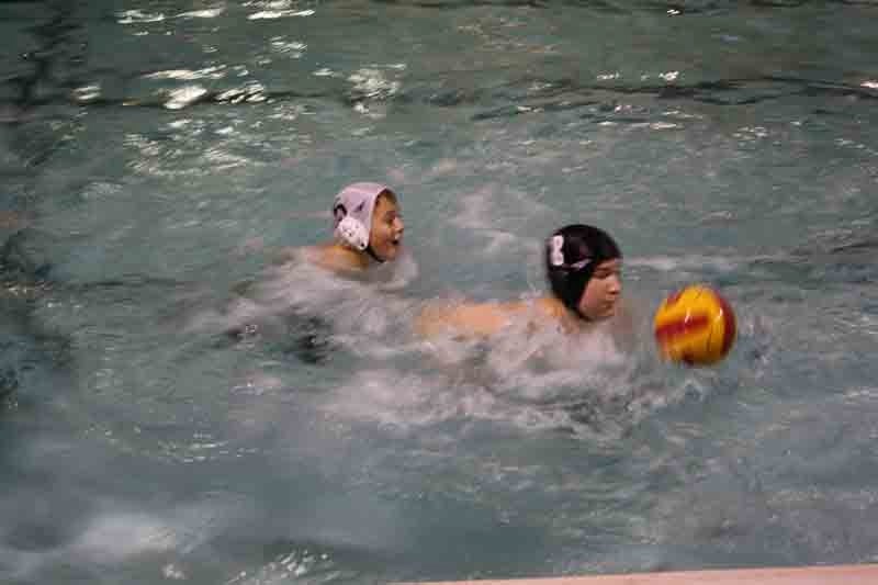The Hurricanes water polo team practises Wednesday night at the pool. The group just started up their season and are planning to host a tourney the first weekend in December.
