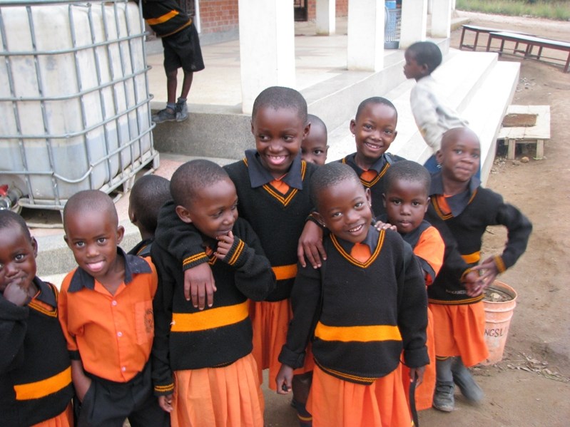 A gathering of school children at lunch time at the school in masaka in 2013.