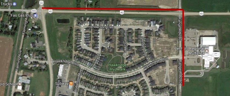 An outline in red of proposed lighting along Waskasoo Avenue and Highway 42 in Penhold.