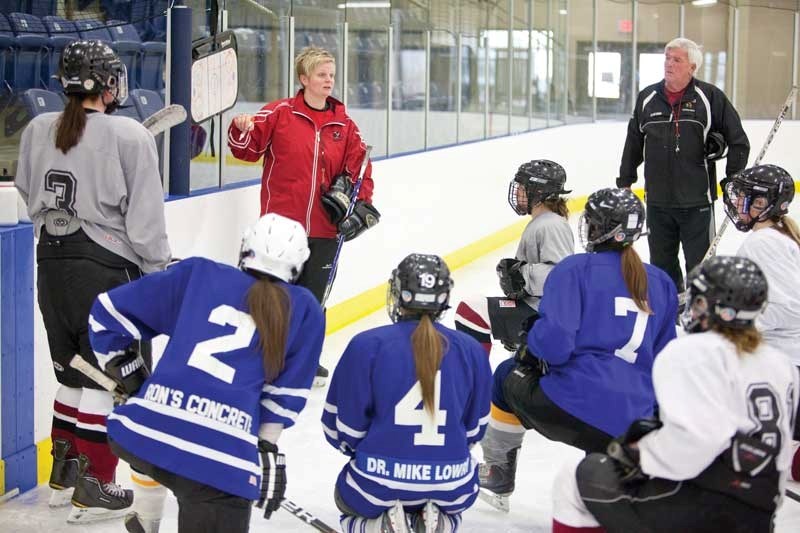 The Central Alberta Amazons get instruction during a practice session at the Penhold Regional Multiplex on Mar. 19.