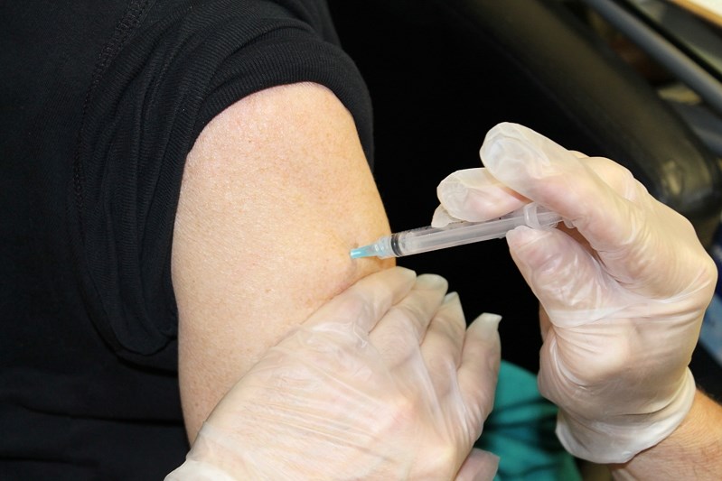 An Innisfail citizen gets flu shot on Jan. 3. There have been no reported cases of H1N1 in Innisfail to date.