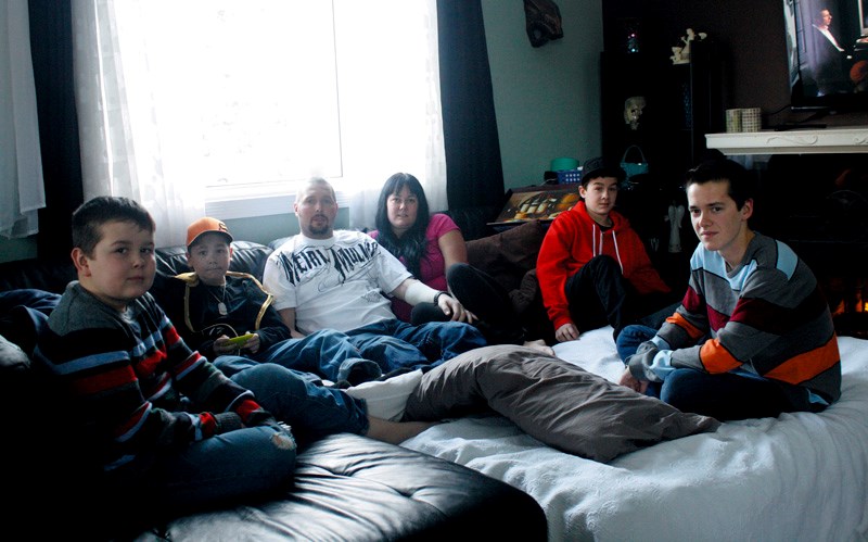 The Wright family hangs out with dad Ken days before he is fitted for a prosthetic leg.