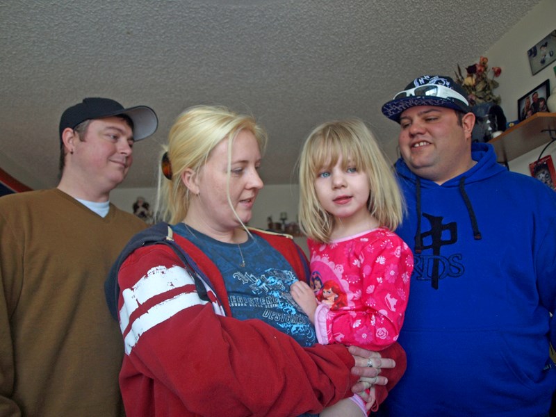 J.J. Kidd (left) and Greg Nickel (right) visited Robin Brand and her daughter Brooke, who is dying from Batten disease, last Friday. Kidd donated $10,000 while Nickel added