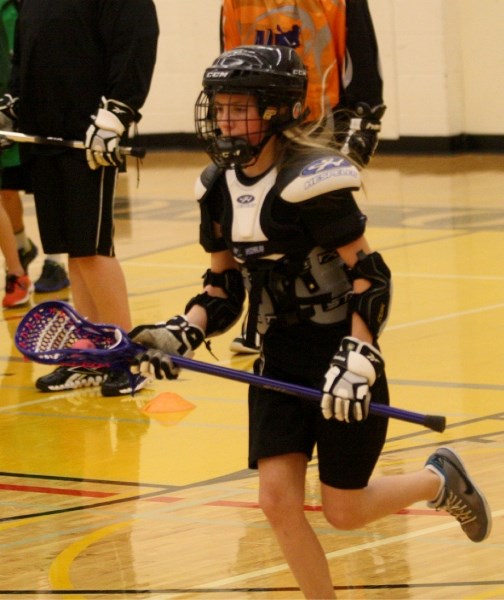 Innisfail Minor Lacrosse Association players have to go to Olds to participate in a winter training camp run by Calgary Roughnecks Captain Andrew McBride.