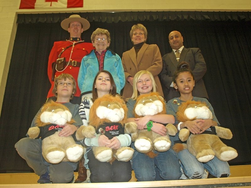 The four best D.A.R.E. reports were announced at the Jan. 17 graduation for 113 Gr. 5 students at both Innisfail Middle School and St. Marguerite Bourgeoys School. The four