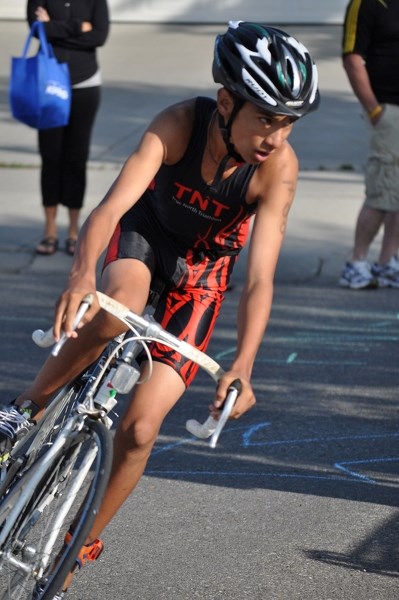 Alexander Ramrattan focuses on a turn during the Lake Chaparral Kids of Steel triathalon event in last year.