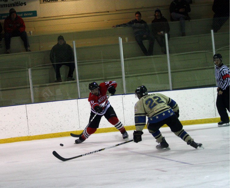 Darryl LaPlante makes a crisp pass in the face of a tenacious Generals defence.