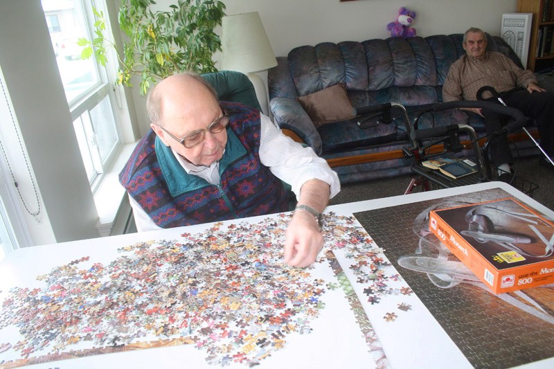 Autumn Glen Lodge resident Bill Carleton is a whiz at puzzling activities.