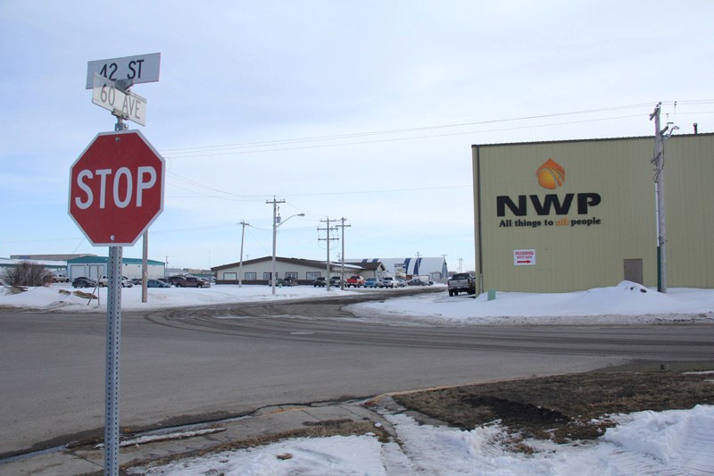Town council carried first reading of a bylaw that would see a portion of 60 Avenue and 42 Street permanently closed. But the town will hold a public hearing on the matter
