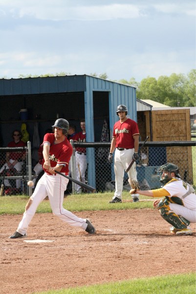 Brant Stickel, centerfielder for the Calgary Diamondbacks, connects with a pitch during the A side baseball finals in Innisfail June 9.