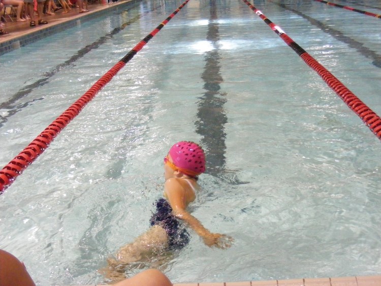 Amy Valentine competes in the Girls 50-meter Long Free event at the Innisfail Dolphins Swim meet on June 30.