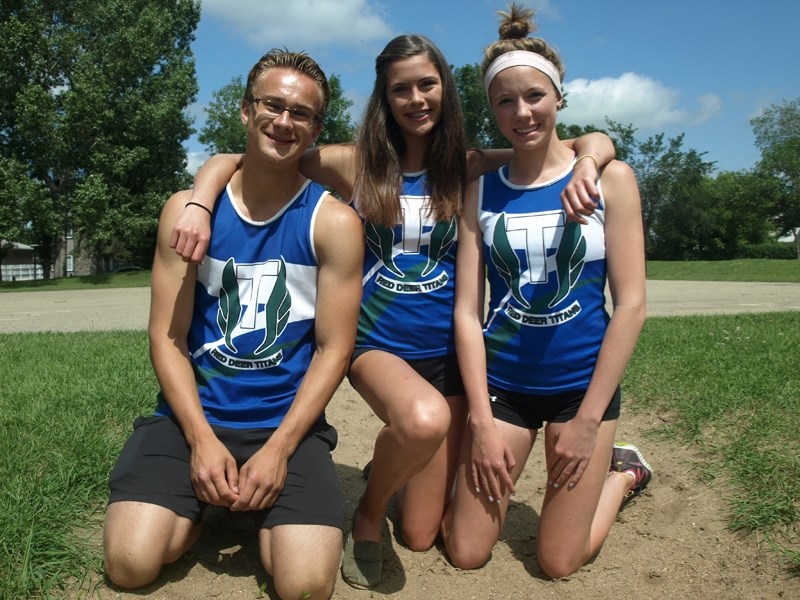 Innisfail&#8217;s Brayden Posyluzny, Mackenzie Ramsell (centre) and Emily Lucasare are all representing Team Alberta in the 2013 Legion Canadian Youth Track and Field