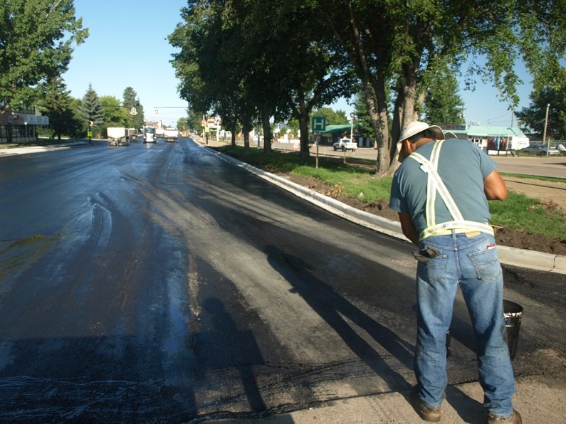 Work crews finish paving and putting the final touches on Phase II of the $2.8 million Downtown Revitalization Project last week. The two-block stretch of Main Street is now