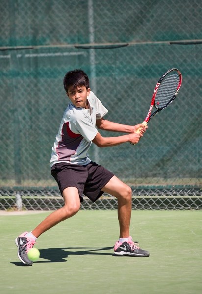 Innisfail&#8217;s Charvher Dael looks to tennis great Roger Federer for inspiration in his quest to make his mark in tennis.