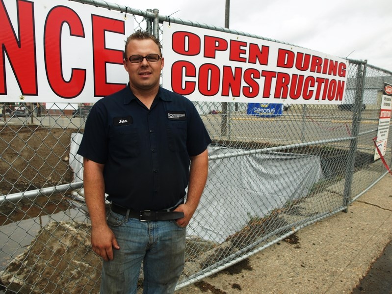 John Schneider, owner of Innisfail 2020 Auto Service, says the contamination from the old gas tanks under the front of his shop is worse than first suspected.